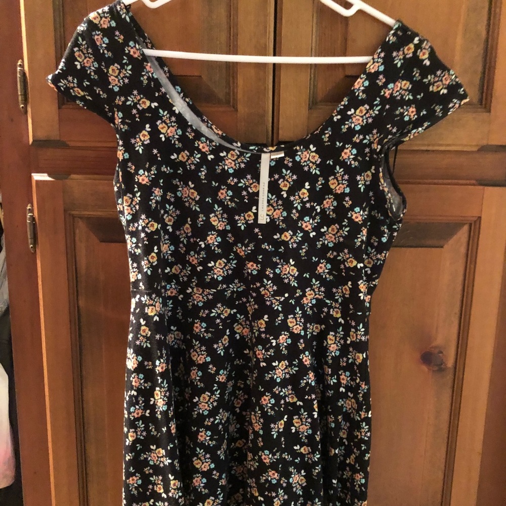 LC Black flowered, cap sleeve top.
